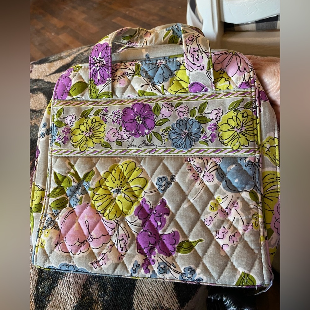 This is a Vera Bradley small travel bag perfect condition